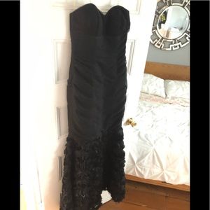 Black mermaid cut strapless evening gown